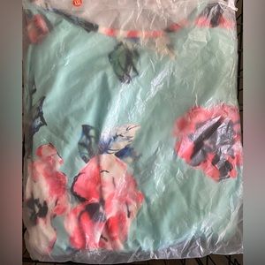 Turquoise maxi dress with flowers.